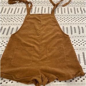 i’m selling a large mustard brown jumpsuit from SHEIN